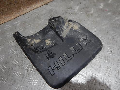 Фотография Брызговик передний левый, Toyota (Тойота)-HILUX PICK-UP (15-)